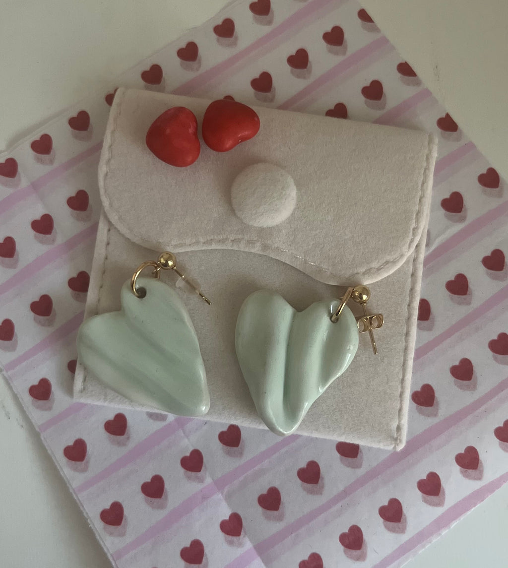 Draped in the shape of a heart.