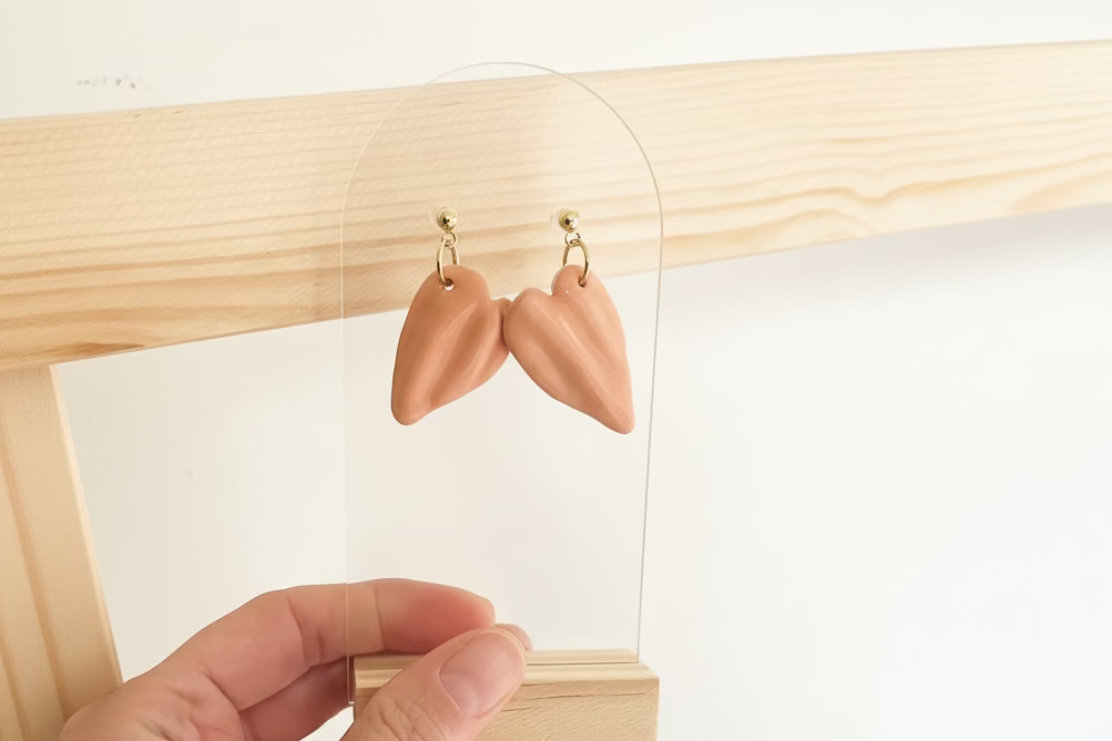 Coeur drapé pêche en porcelaine